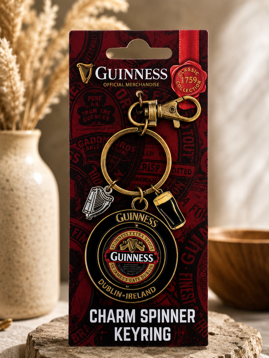 GUINNESS RUBY RED PVC SPINNER KEYRING