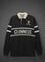 Black rugby shirt with white stripes and 'Guinness' branding on a gray background