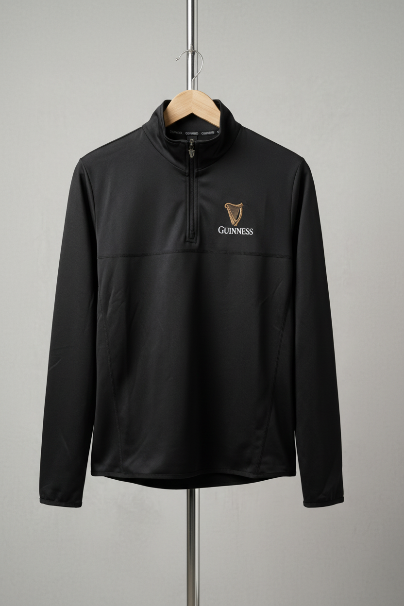 Black pullover with Guinness logo on a gray background