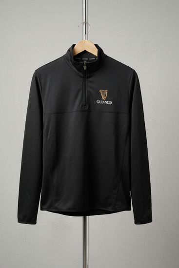 Black pullover with Guinness logo on a gray background