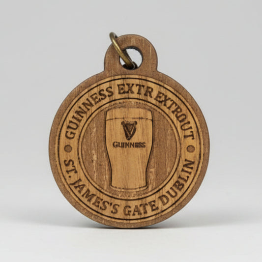 Guinness keyring with brand logo on a clear background
